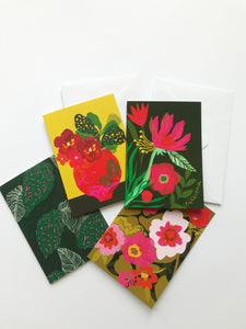 Collection of 4 hand drawn illustrated botanical cards with lilies and pansies.
